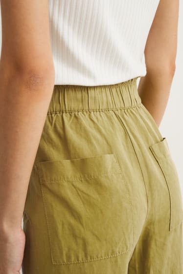 Dámské - Plátěné kalhoty - high waist - tapered fit - zelená