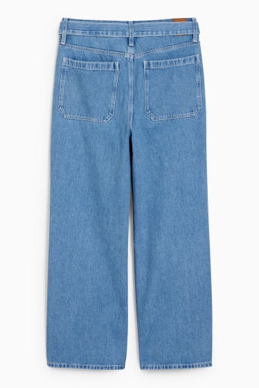 Femmes - Jean à jambe évasée avec ceinture - high waist - jean bleu clair