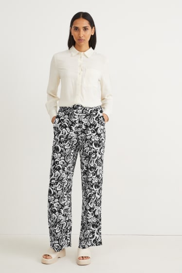 Femmes - Pantalon de toile - mid waist - wide leg - à motif - noir / blanc