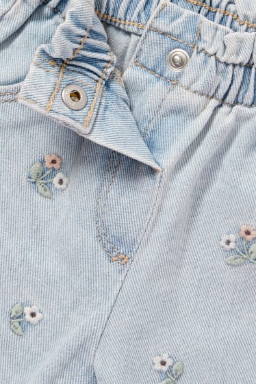Bébés filles - Jean bébé - à fleurs - jean bleu clair