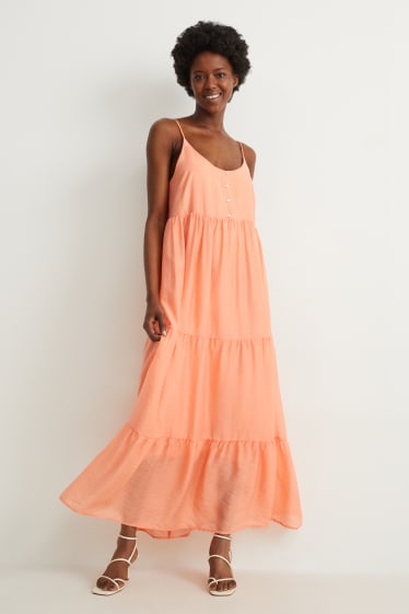 Dona - El vestit de línia A - taronja