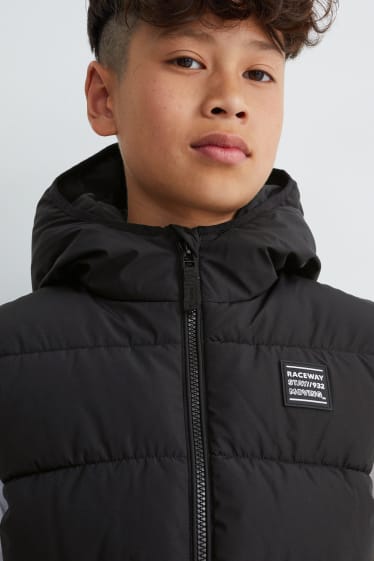 Kinderen: jongens - Gewatteerde bodywarmer met capuchon - zwart