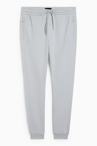 Uomo - Pantaloni sportivi - grigio chiaro
