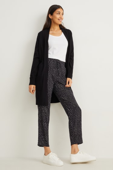 Femei - Pantaloni de stofă - talie înaltă - tapered fit - cu buline - negru / alb