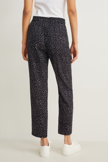 Damen - Stoffhose - High Waist - Tapered Fit - gepunktet - schwarz / weiß