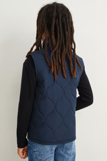 Nen - Armilla embuatada - blau fosc