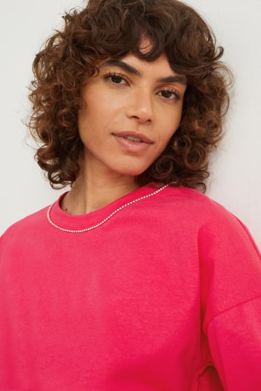 Femmes - T-shirt avec application de chaînes - rose