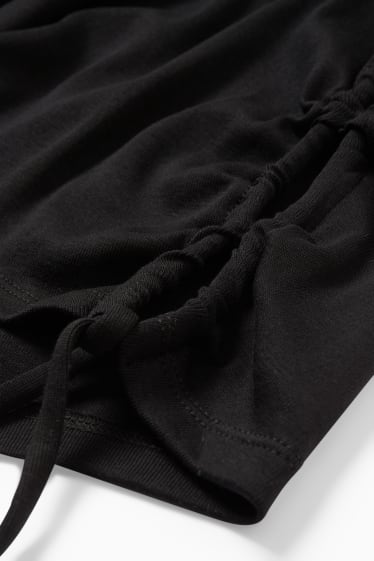Dona - Samarreta crop - negre