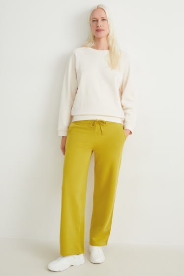 Donna - Pantaloni sportive basic - giallo