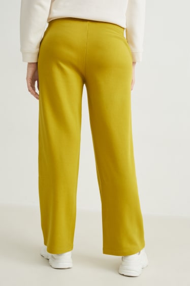 Donna - Pantaloni sportive basic - giallo