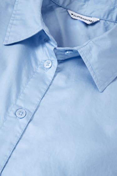 Nastolatki - CLOCKHOUSE - krótka bluzka - jasnoniebieski