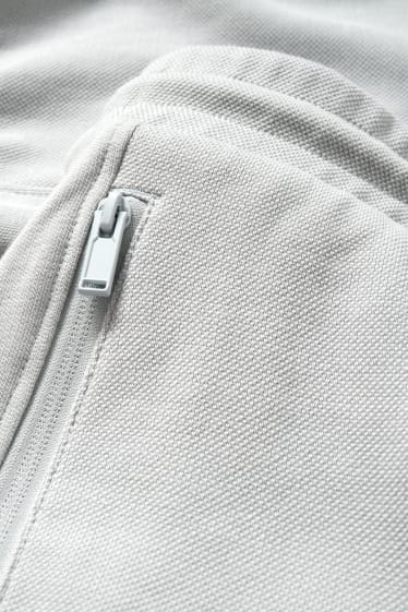 Pánské - Teplákové kalhoty - světle šedá