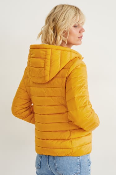 Women - Quilted jacket with hood - yellow