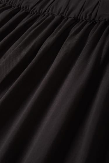 Dona - Faldilla - negre