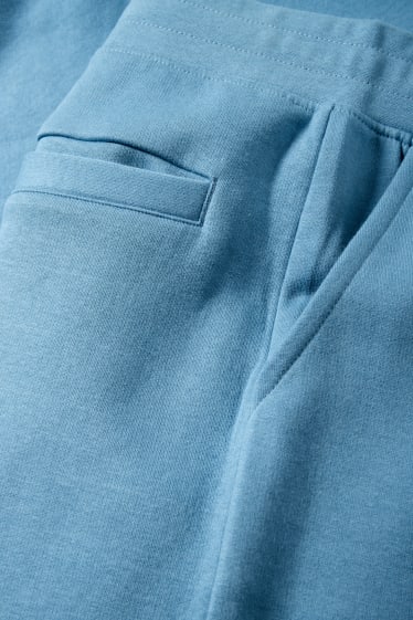 Uomo - Pantaloni sportivi - blu