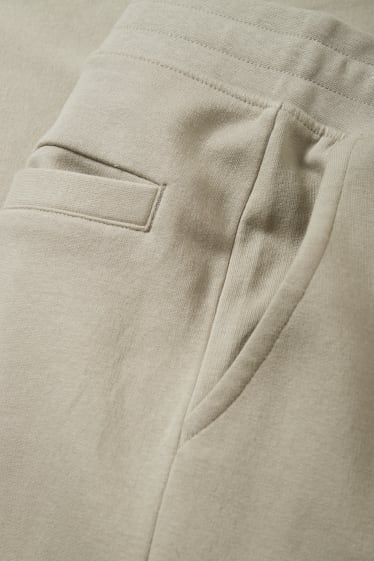 Mężczyźni - Spodnie dresowe - piaskowy