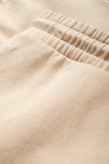 Uomo - Pantaloni sportivi - beige