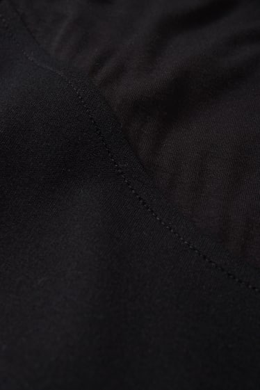 Dámské - Těhotenské kalhoty - černá