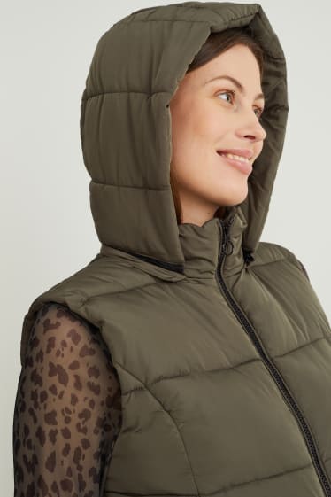 Women - Maternity quilted gilet with hood and baby pouch - dark green