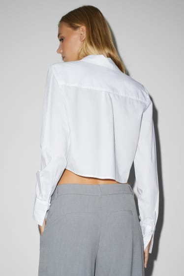 Jóvenes - CLOCKHOUSE - blusa crop - blanco