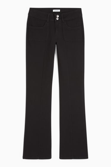 Jóvenes - CLOCKHOUSE - pantalón - low waist - bootcut fit - negro