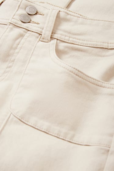 Nastolatki - CLOCKHOUSE - spodnie - niski stan - bootcut fit - jasny beż
