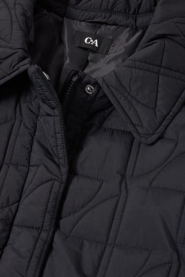 Femmes - Manteau matelassé avec sac à la taille - noir