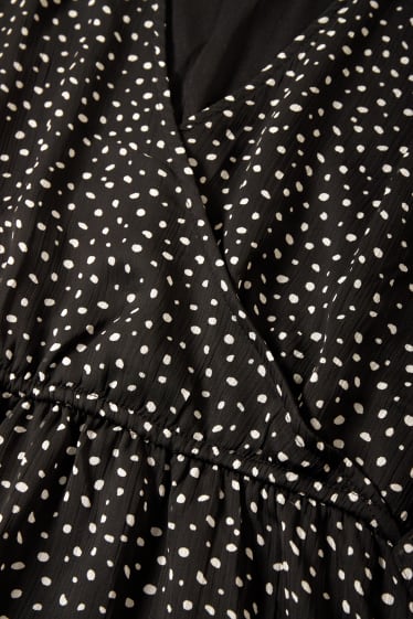 Donna - CLOCKHOUSE - vestito a portafoglio - a pois - nero