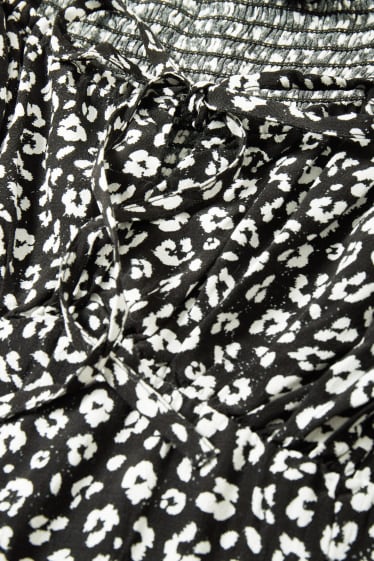 Jóvenes - CLOCKHOUSE - vestido de viscosa - de flores - negro / blanco