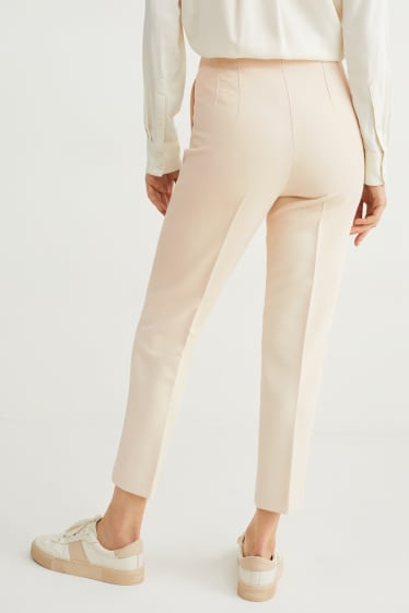 Dona - Pantalons de tela - high waist - regular fit - beix clar