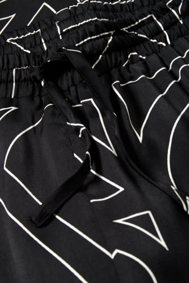 Femei - Saténové pyžamové kalhoty - negru