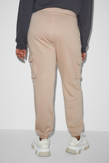 Kobiety - CLOCKHOUSE - spodnie dresowe w stylu bojówek - brązowoszary