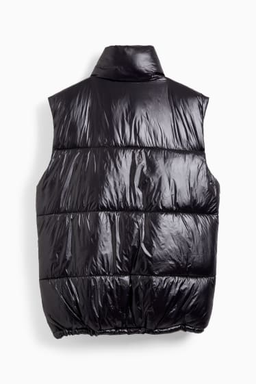 Women - Long quilted gilet - black