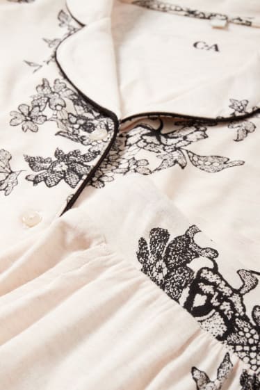 Dona - Pijama - de flors - beix clar