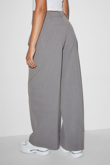 Jóvenes - CLOCKHOUSE - pantalón de tela - mid waist - wide leg - gris claro