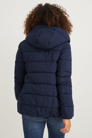 Dámské - Těhotenská prošívaná bunda s kapucí - nosící - tmavomodrá