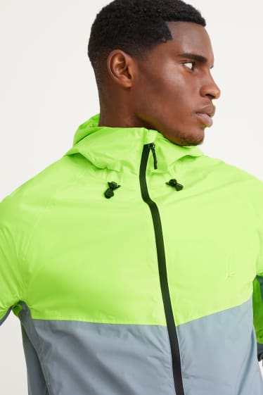 Hombre - Chubasquero con capucha - impermeable - verde fosforito