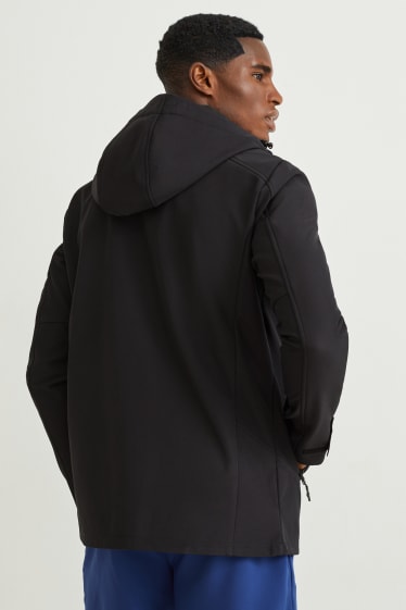 Uomo - Giacca softshell con cappuccio - idrorepellente - 4 Way Stretch - nero