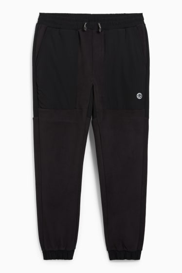 Uomo - Pantaloni sportivi - nero