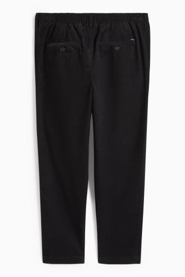 Hommes - Chino en velours côtelé - tapered fit - noir