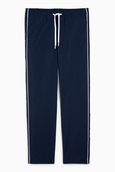 Ragazzi e giovani - CLOCKHOUSE - pantaloni sportivi - blu scuro