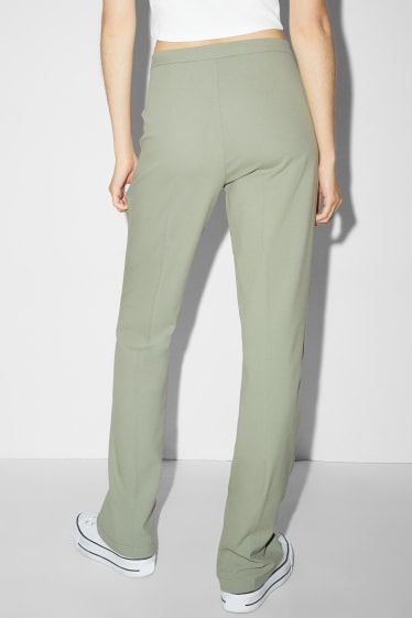 Ados & jeunes adultes - CLOCKHOUSE - pantalon en toile - mid waist - bootcut fit - vert clair