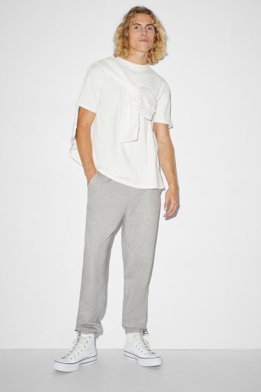 Hommes - Pantalon de jogging - gris clair chiné