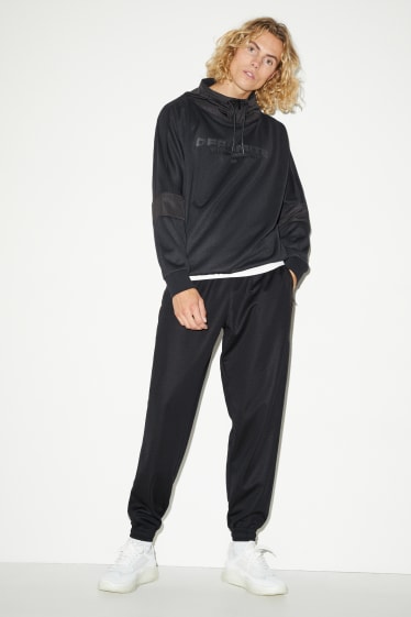 Hommes - Pantalon de jogging - noir