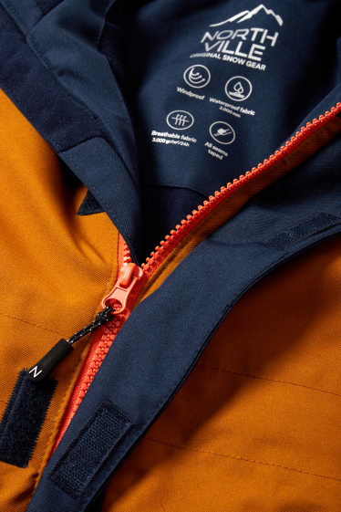 Kinderen: jongens - Skipak met capuchon - oranje / blauw