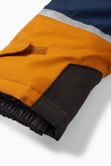 Kinderen: jongens - Skipak met capuchon - oranje / blauw