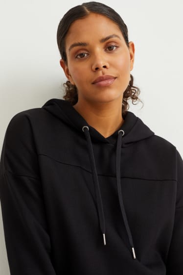 Dames - Sportieve hoodie - zwart