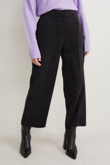 Donna - Pantaloni di velluto - vita media - gamba ampia - nero