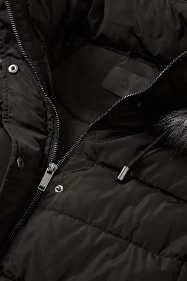 Donna - Cappotto trapuntato con cappuccio e riporto di ecopelliccia. - nero