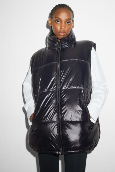 Women - Long quilted gilet - black